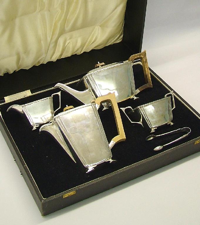 Appraisal: Boxed Art Deco four piece tea service of square tapering