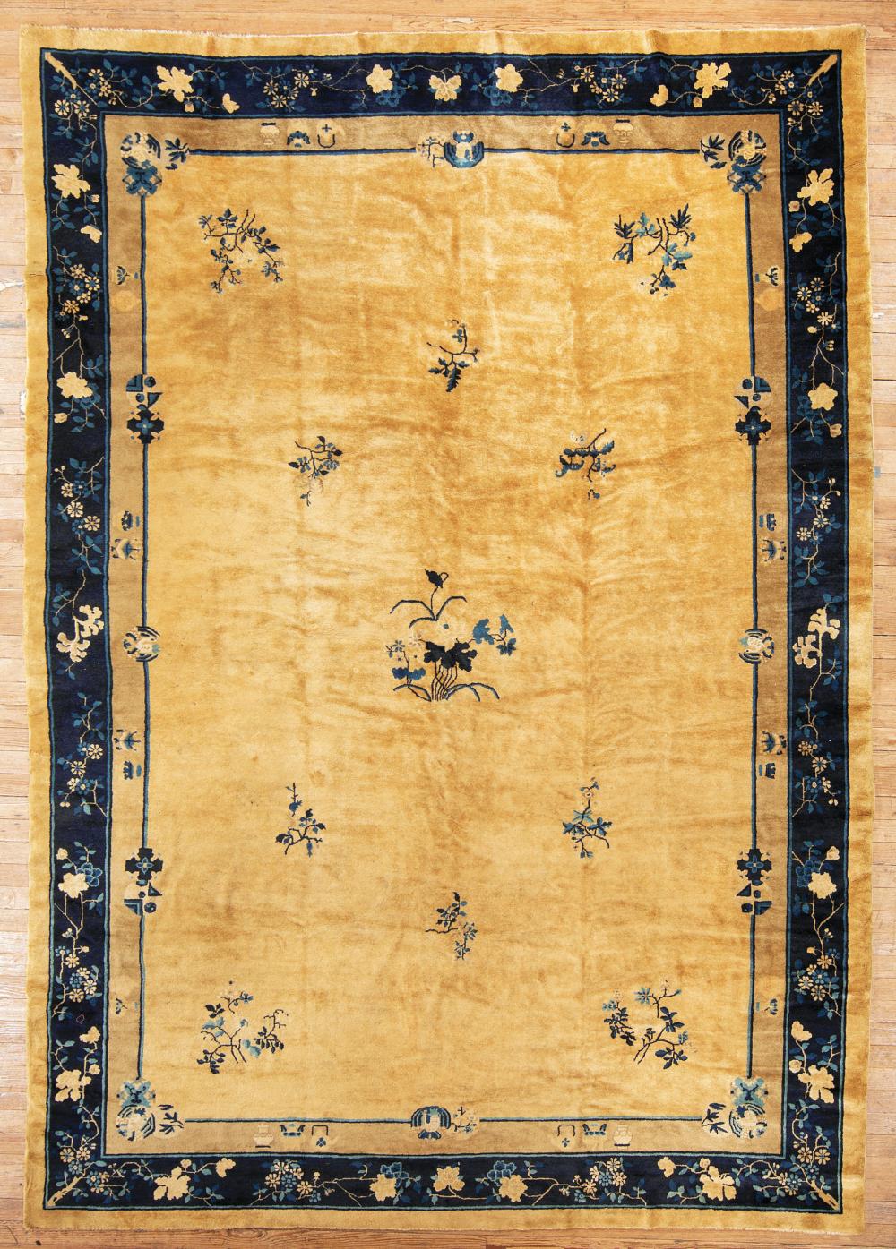 Appraisal: Chinese Nichols Wool Carpet c light brown ground blue border