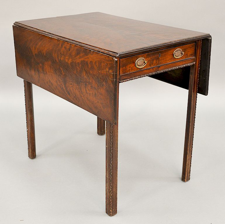 Appraisal: George II mahogany table with rectangular drop leaves and one