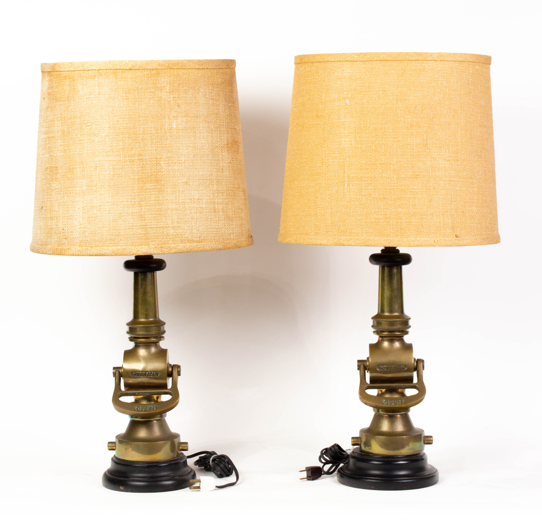 Appraisal: A pair of Powhatan bronze fire nozzles mounted as table