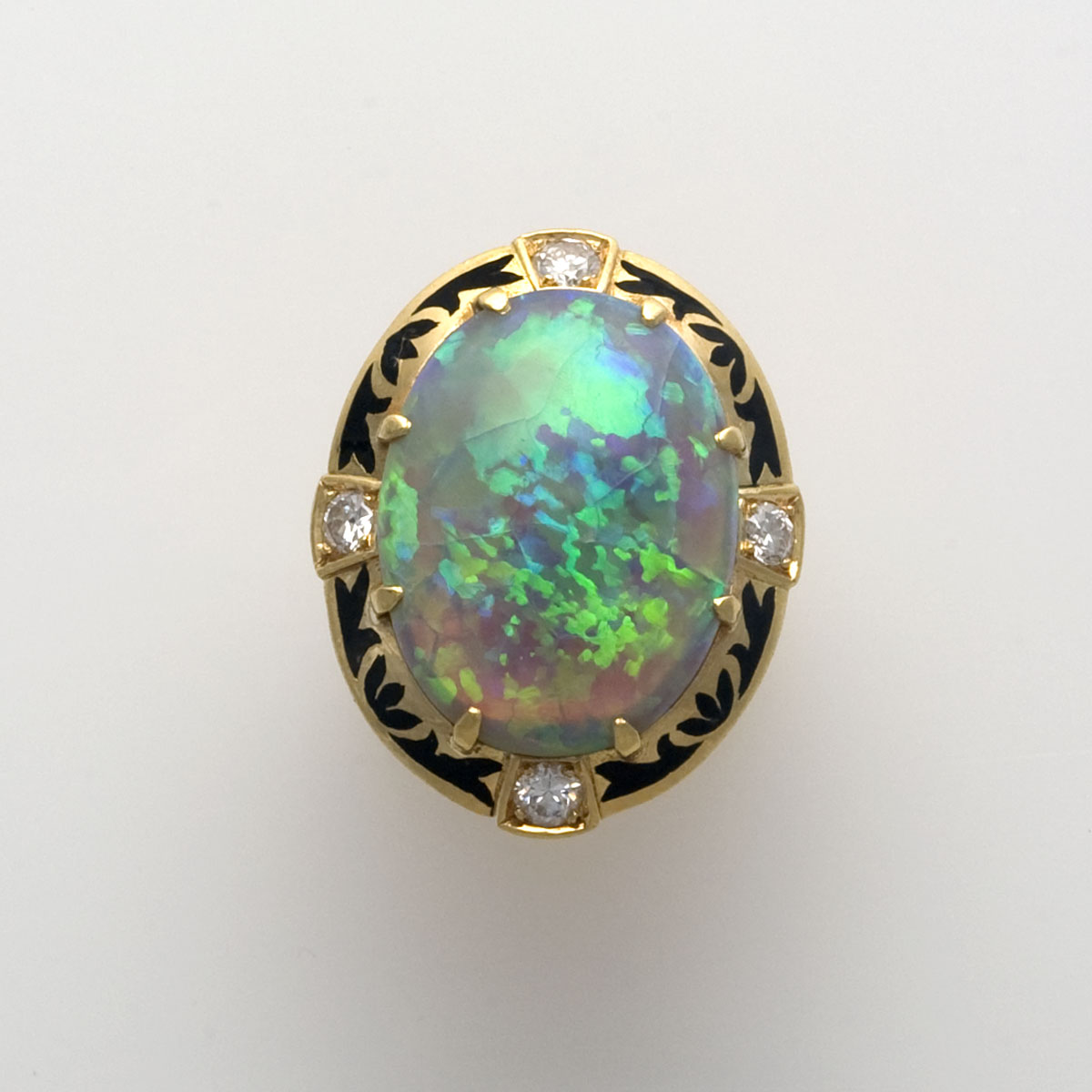 Appraisal: OPAL DIAMOND ENAMEL AND GOLD RING Set with an oval