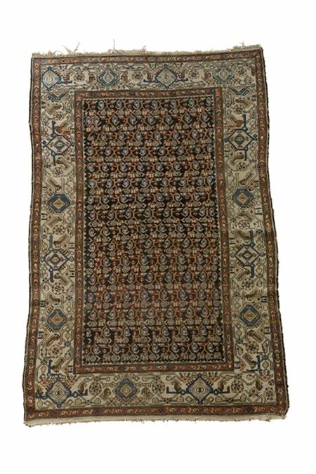 Appraisal: A Fereghan rug late th century the dark brown field