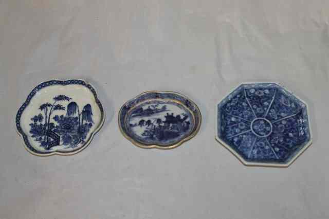 Appraisal: TWO CHINESE BLUE AND WHITE TEAPOT STANDS and a spoon