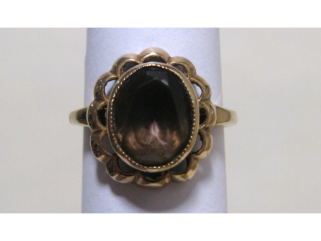 Appraisal: Nine carat gold smokey topaz single stone ring