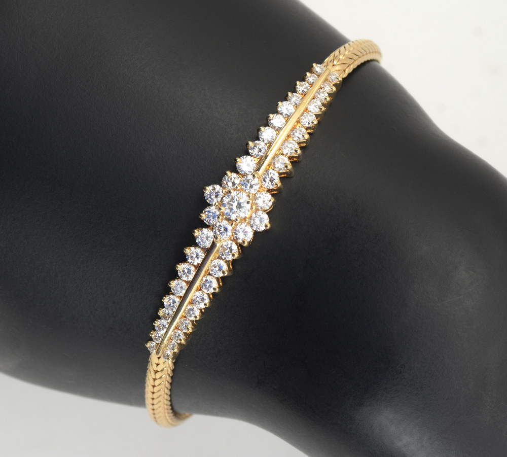 Appraisal: CTW DIAMOND AND K BRACELET K yellow gold bracelet contains