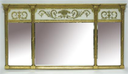 Appraisal: Regency style giltwood and eglomise wall mirrorWith a carved breakfront