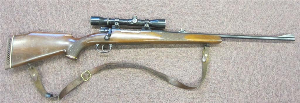 Appraisal: BOLT ACTION SPORTING RIFLE WITH TELESCOPIC SIGHT VOERE SERIAL NUMBER