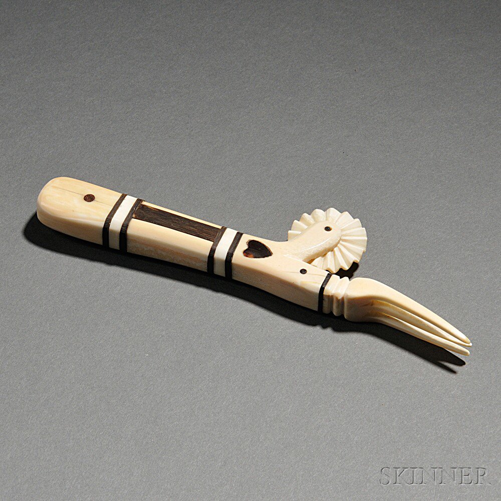 Appraisal: Carved and Inlaid Jagging Wheel the tapering handle inlaid with