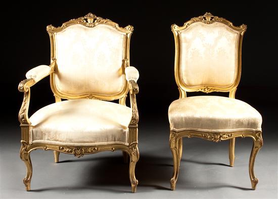 Appraisal: Louis XV style carved giltwood upholstered armchair and matching side