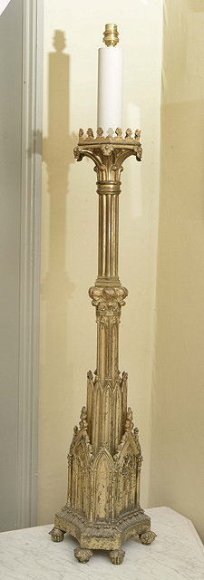 Appraisal: A GILT BRONZE GOTHIC REVIVAL CHURCH CANDLESTICK the reeded column