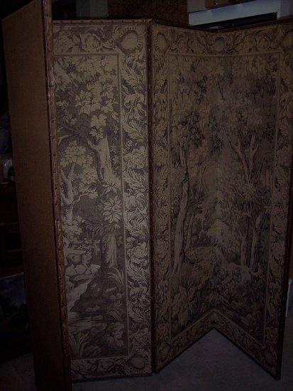 Appraisal: A four fold screen th Century covered in machine woven