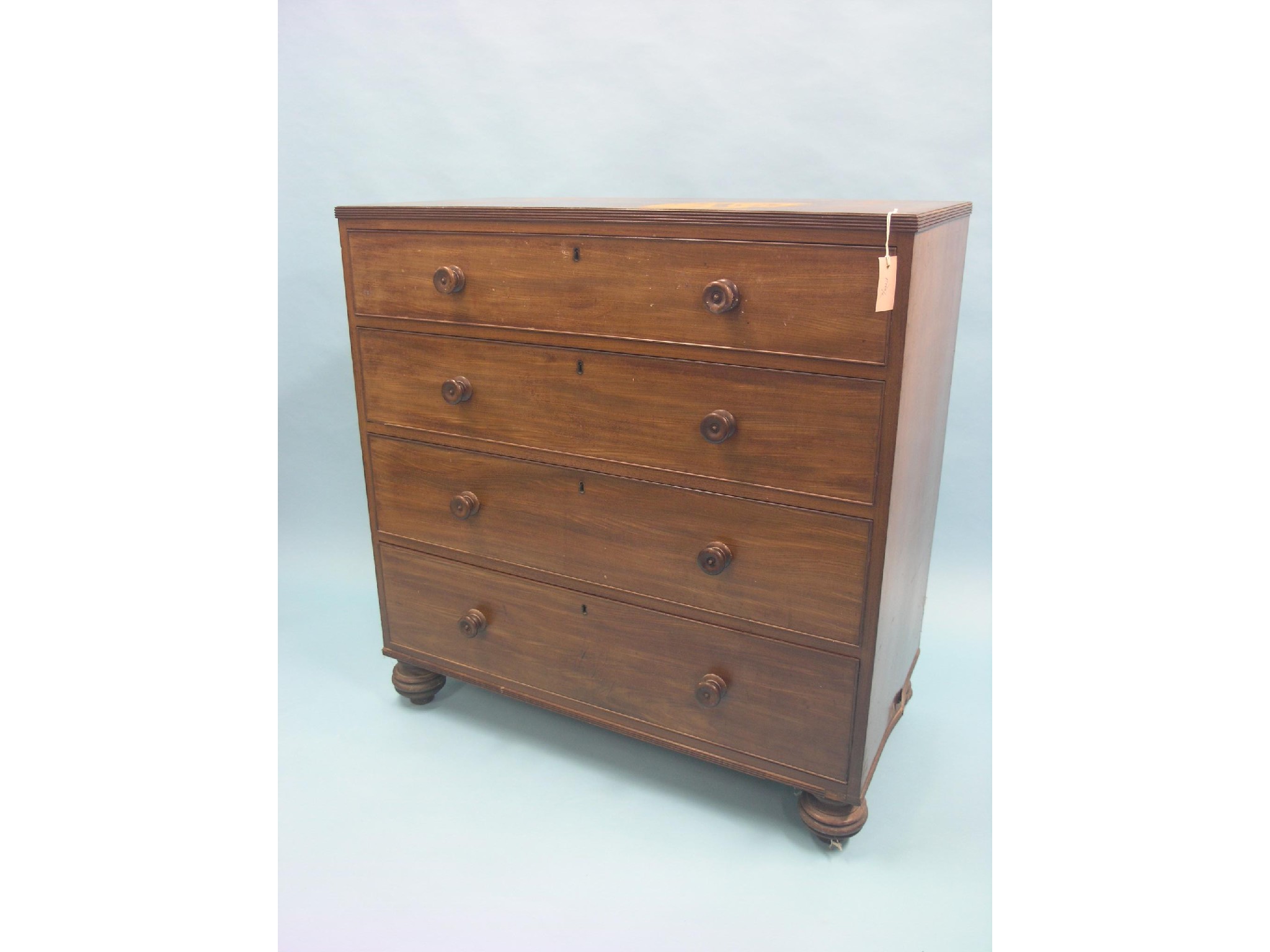 Appraisal: An early Victorian mahogany chest four graduated drawers each with