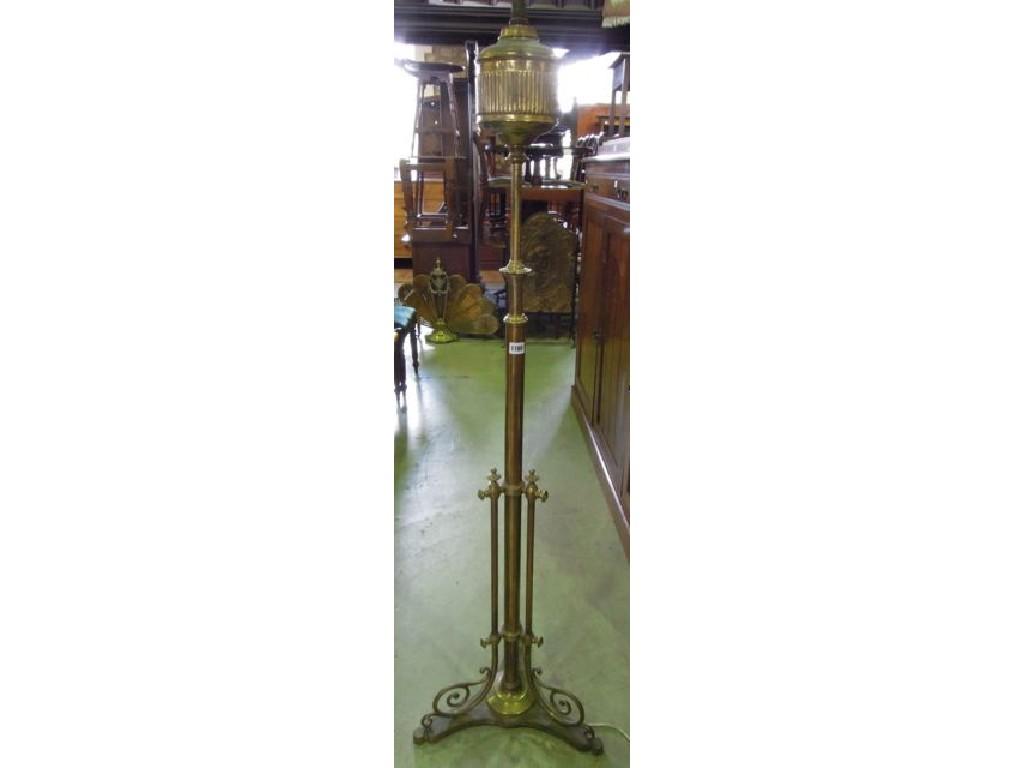 Appraisal: A Victorian brass telescopic oil lamp standard with turned column