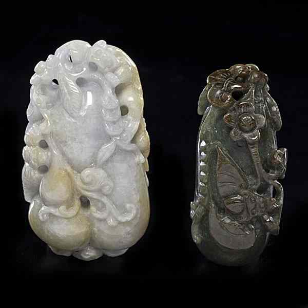 Appraisal: Chinese Jade Gourds Chinese th century Two jade carvings in