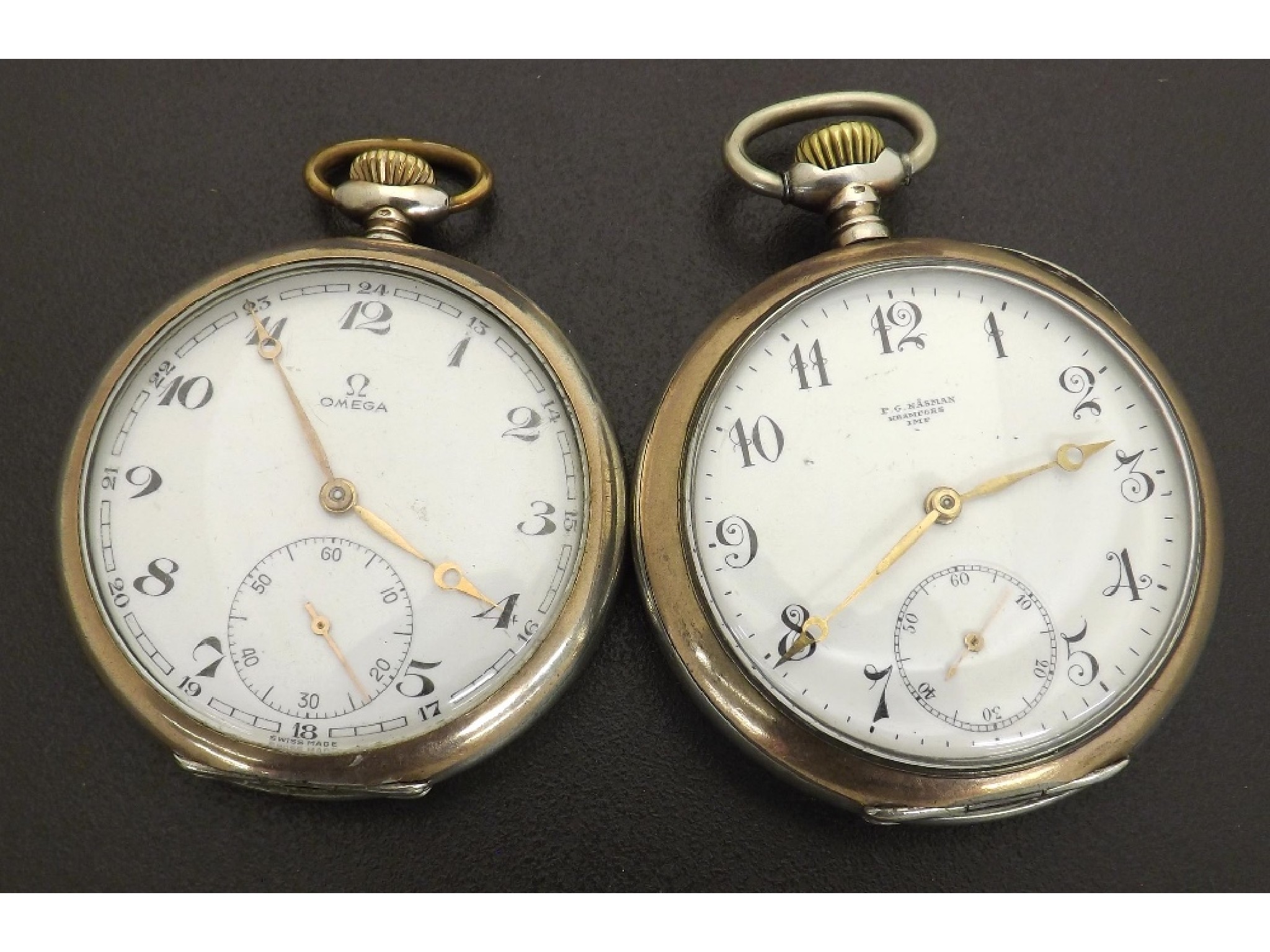 Appraisal: Two Omega white metal engine turned and gold plated pocket