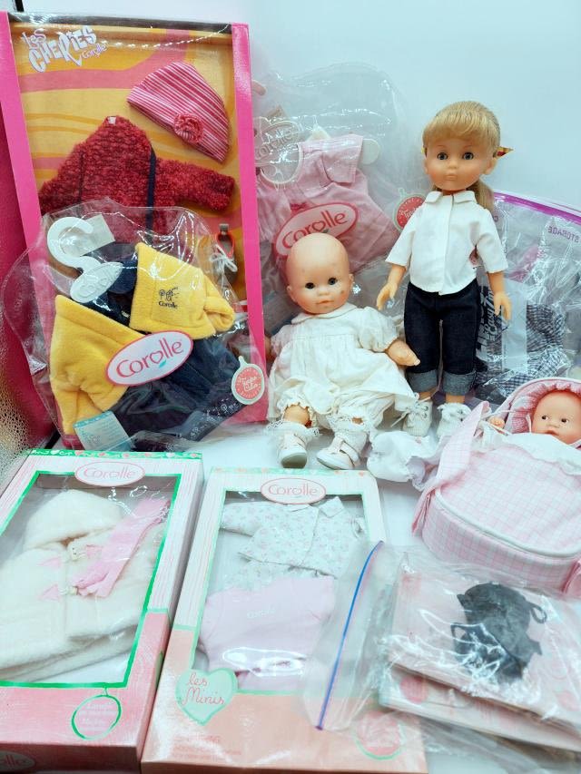 Appraisal: Group of Corolle Dolls and Clothing Includes a Camille Doll