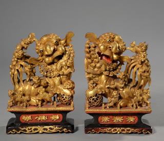 Appraisal: Pair of Chinese carved and gilt foo dogs H x