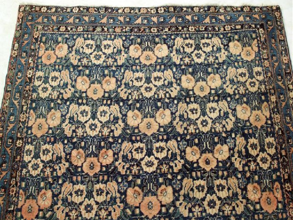 Appraisal: BAKHTARI RUG with a blue ground m by m -