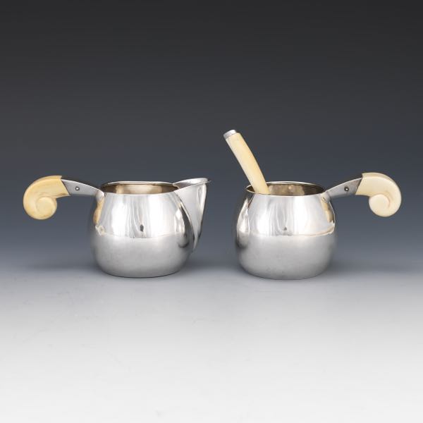 Appraisal: SCANDINAVIAN STERLING SILVER CREAMER AND SUGAR BOWL WITH TEASPOON Bulbous