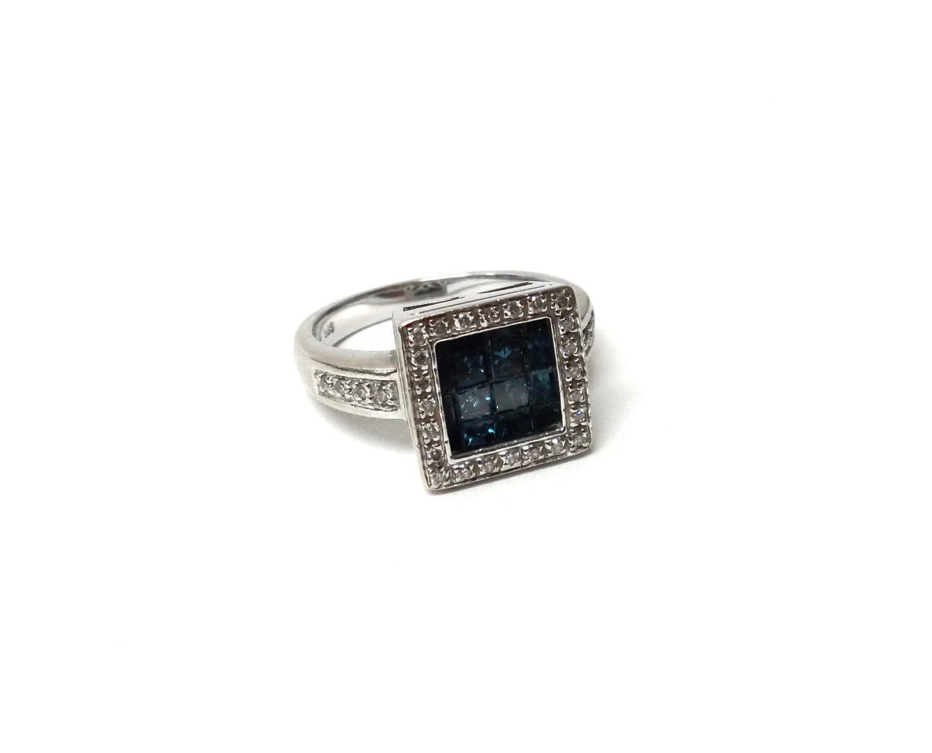 Appraisal: A white gold diamond and treated blue diamond set square