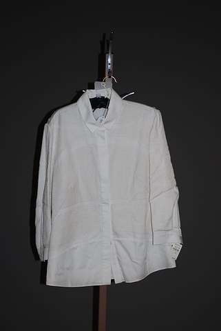 Appraisal: CHADO white cotton long sleeve embroidered shirt Size Neiman Marcus