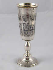 Appraisal: A silver cup with panels of niello scenes Russian marks