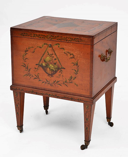 Appraisal: A PAINTED SATINWOOD CELLARETTE of rectangular box form with hinged