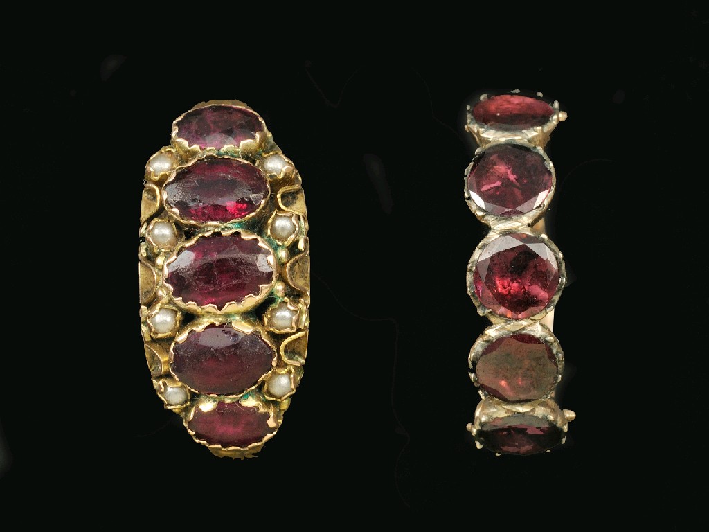 Appraisal: A Victorian Ruby and Seed Pearl Ring rub-over set five