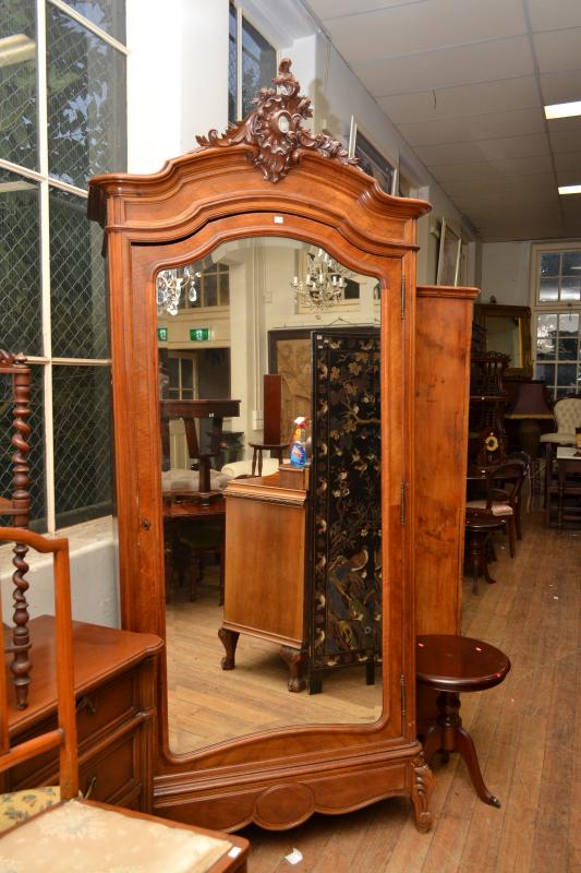 Appraisal: A FRENCH WALNUT ARMOIRE WITH SINGLE MIRRORED DOOR A FRENCH