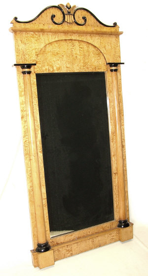 Appraisal: A Biedermeier birch wood and part ebonised pier mirror circa