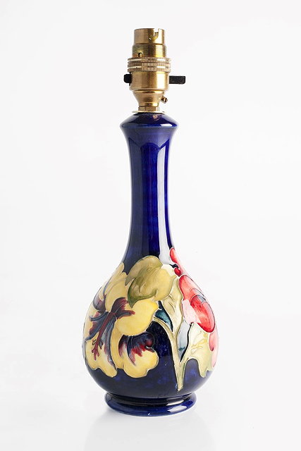 Appraisal: Moorcroft'Hibiscus' lamp baseon blue groundimpressed manufacturer's stamp cm high