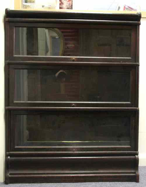 Appraisal: A Globe Wernicke three-section bookcase cm wide