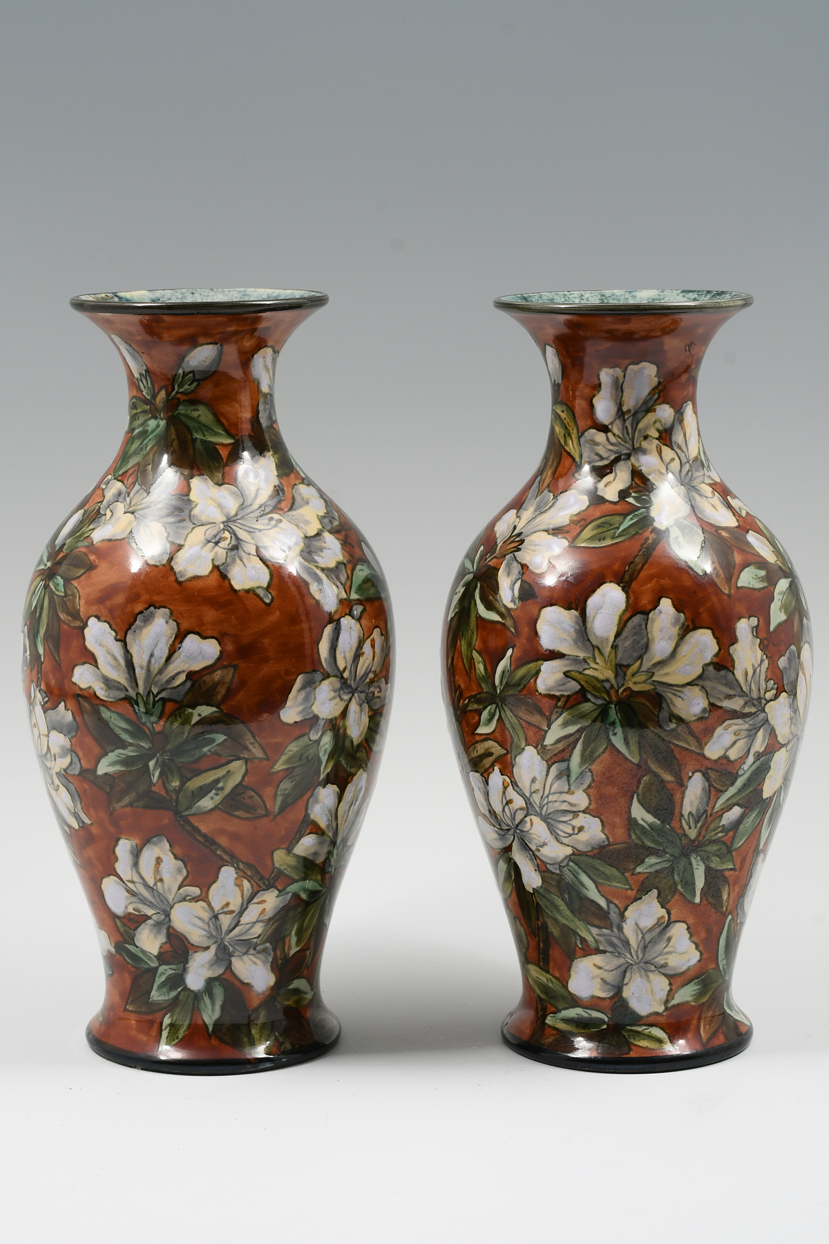 Appraisal: PAIR OF DOULTON LAMBETH FAIENCE BALUSTER VASES Having an overall