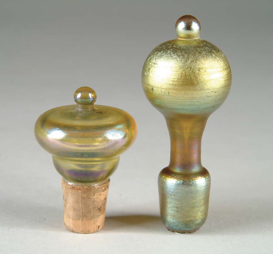 Appraisal: TWO TIFFANY DECANTER STOPPERS Each of gold Favrile glass SIZE