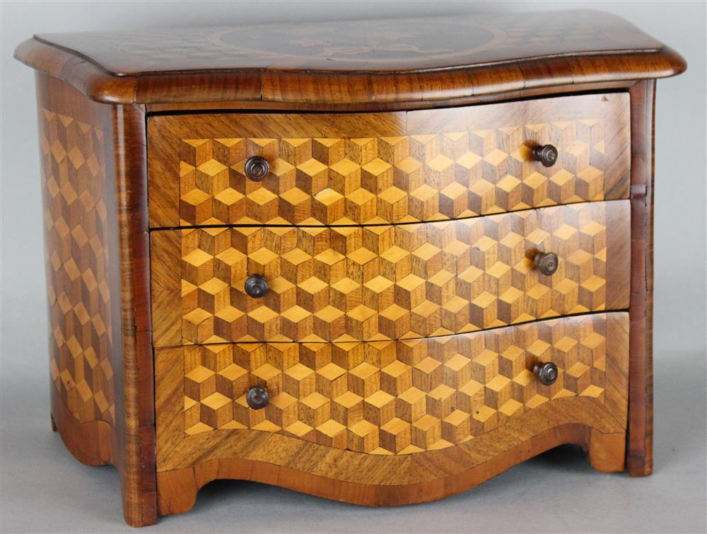 Appraisal: CONTINENTAL MIXED-WOOD MARQUETRY AND PARQUETRY MINIATURE CHEST having a rectangular