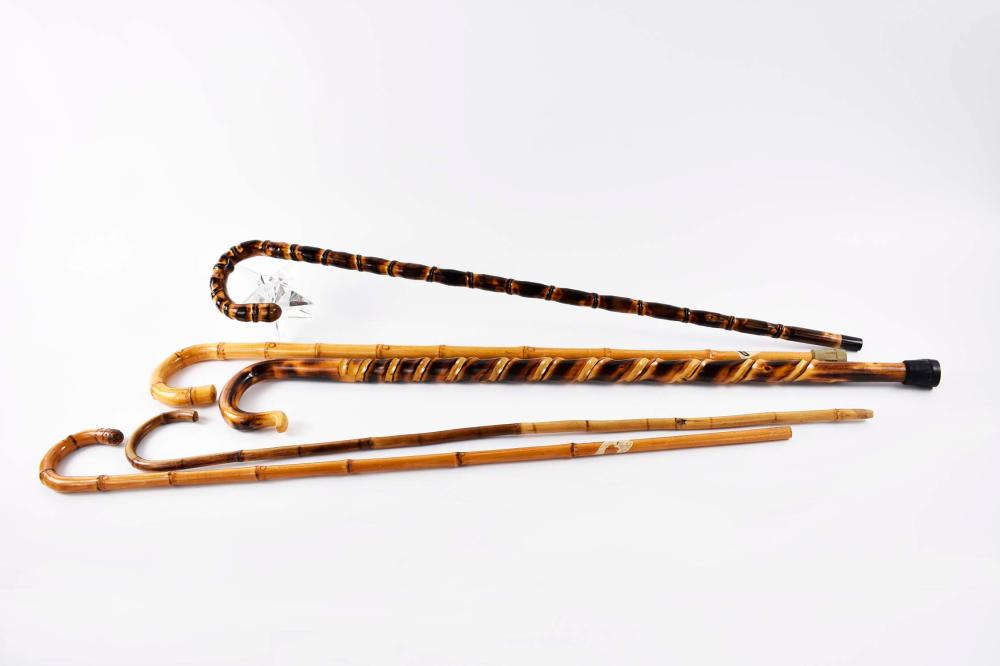 Appraisal: FIVE BAMBOO CROOK-FORM CANESProbably all Asian modern Some two-toned others