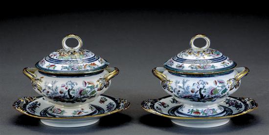 Appraisal: Pair English earthenware covered sauce tureens by Pinder Bourne Hope