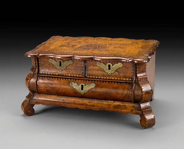 Appraisal: A Dutch inlaid walnut miniature chest early th century The