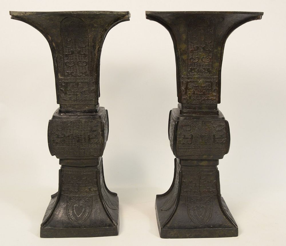 Appraisal: Pair of Chinese Bronze Beaker Vases square form with flared