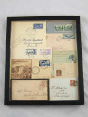 Appraisal: A framed case of nine various franked postage covers