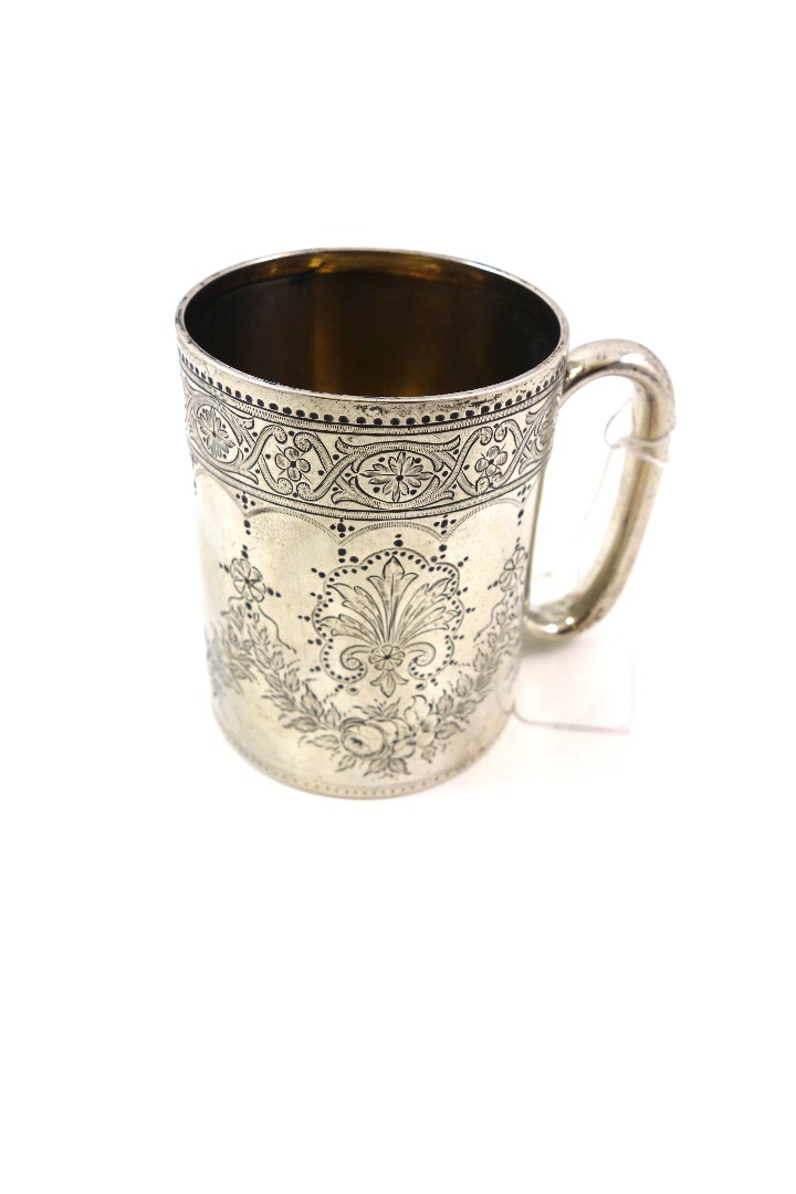 Appraisal: A Victorian silver christening mug London floral and anthemion engraved