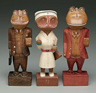 Appraisal: Three frog folk art carvings one figured black walnut two