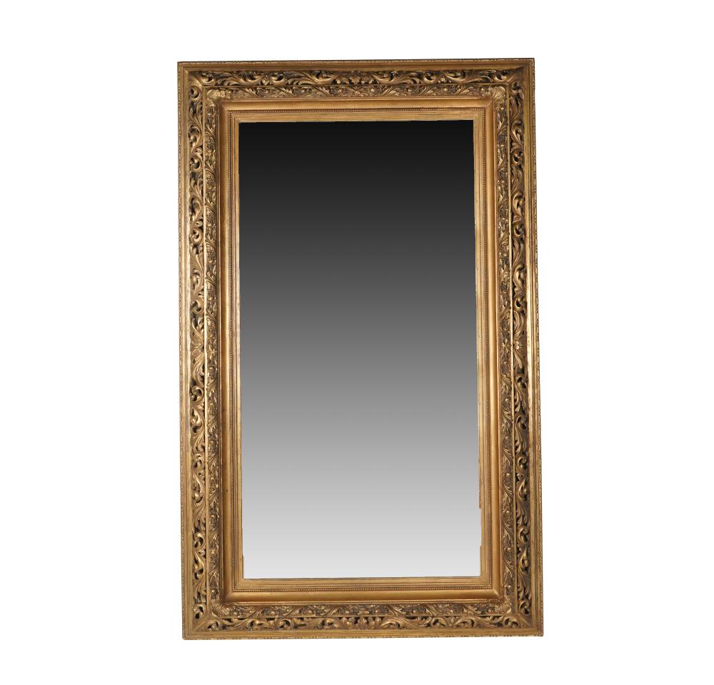 Appraisal: BAROQUE-STYLE CARVED GILTWOOD MIRRORwith beveled glass plate Condition scattered small