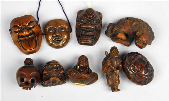 Appraisal: NINE JAPANESE CARVED WOOD NETSUKE including mask form skull form