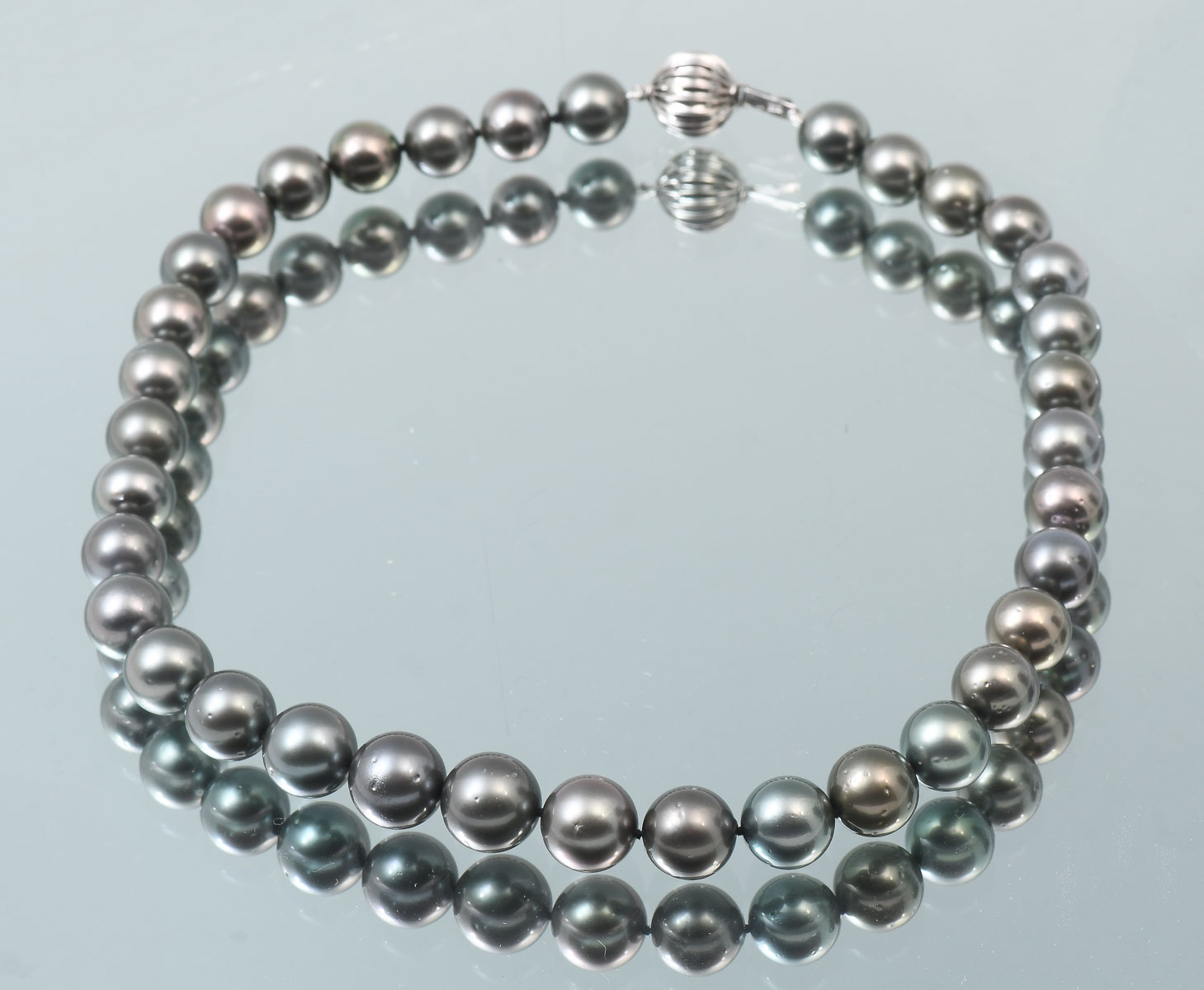 Appraisal: TAHITIAN BLACK PEARL NECKLACE Graduated strand of black cultured Tahitian