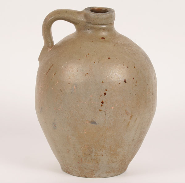 Appraisal: A th century ovoid stoneware jug partially collapsed neck and