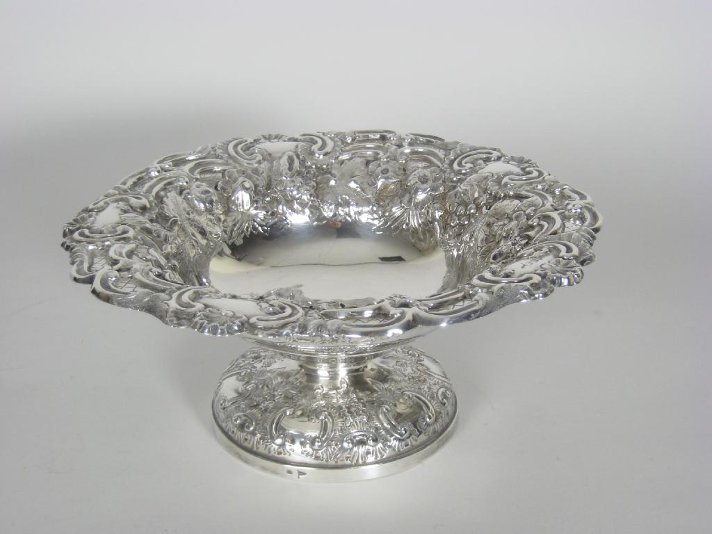 Appraisal: A Victorian Comport floral and scroll embossed on pedestal base