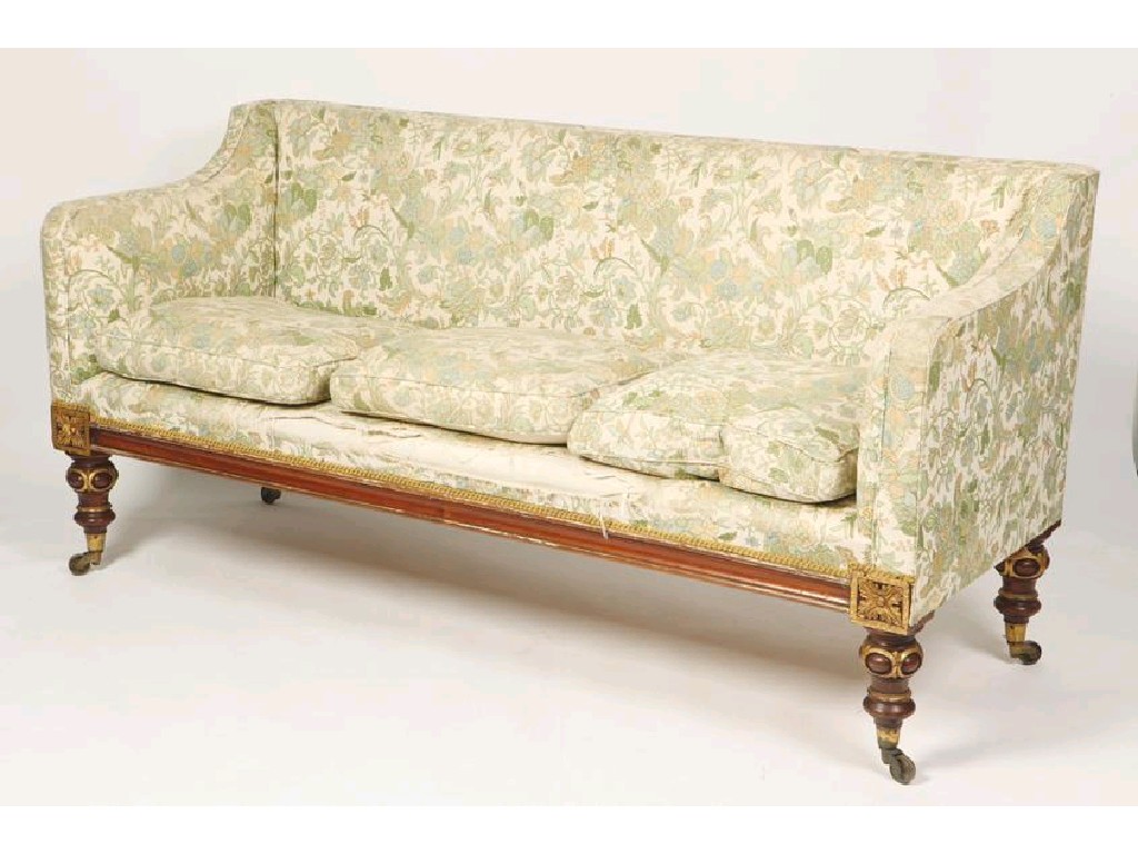 Appraisal: A LATE REGENCY MAHOGANY AND PARCEL-GILT SOFA in the manner