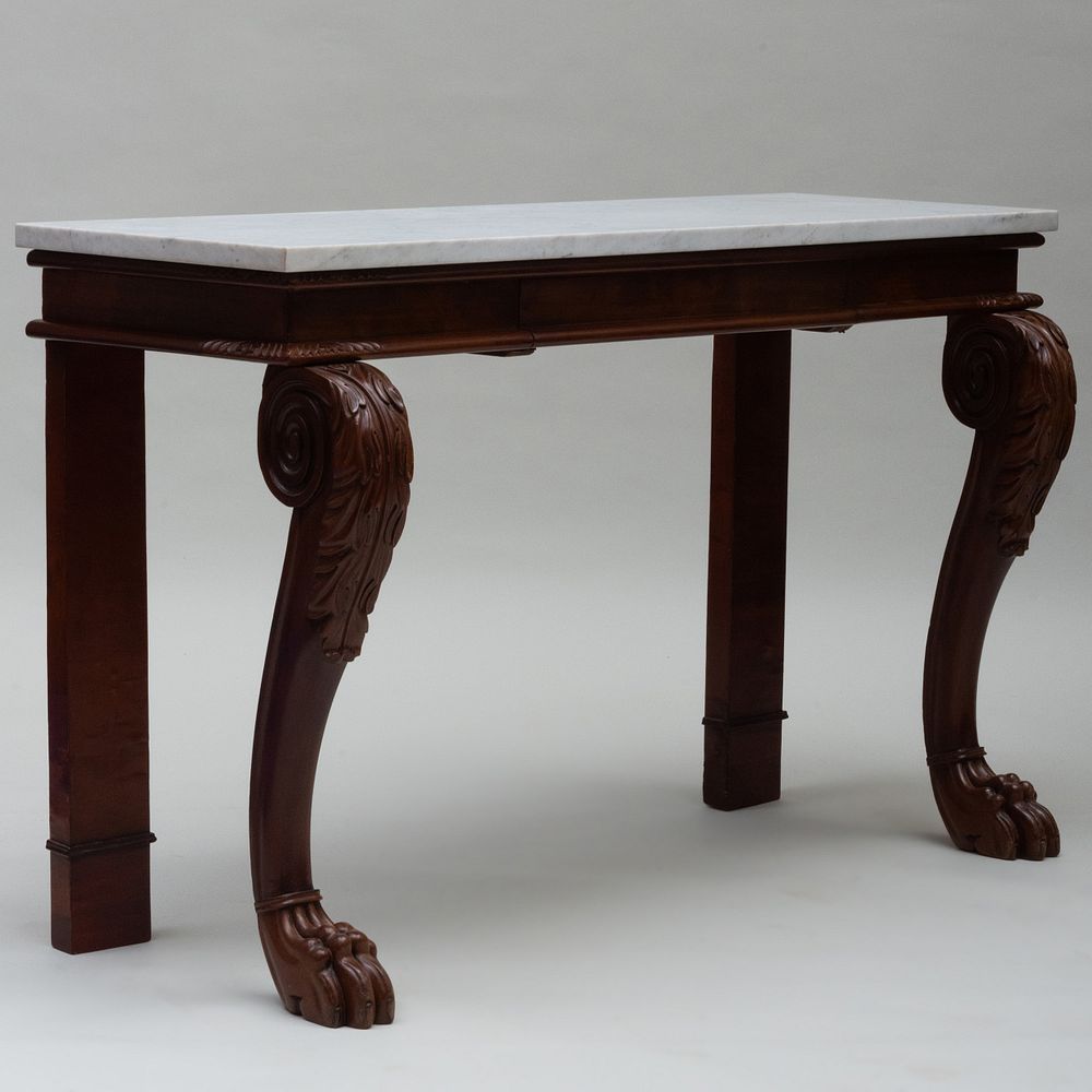 Appraisal: Late Regency Carved Mahogany Console Fitted with a marble top