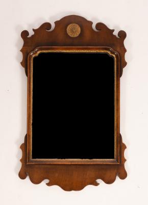 Appraisal: A late th Century mahogany wall mirror with carved ear